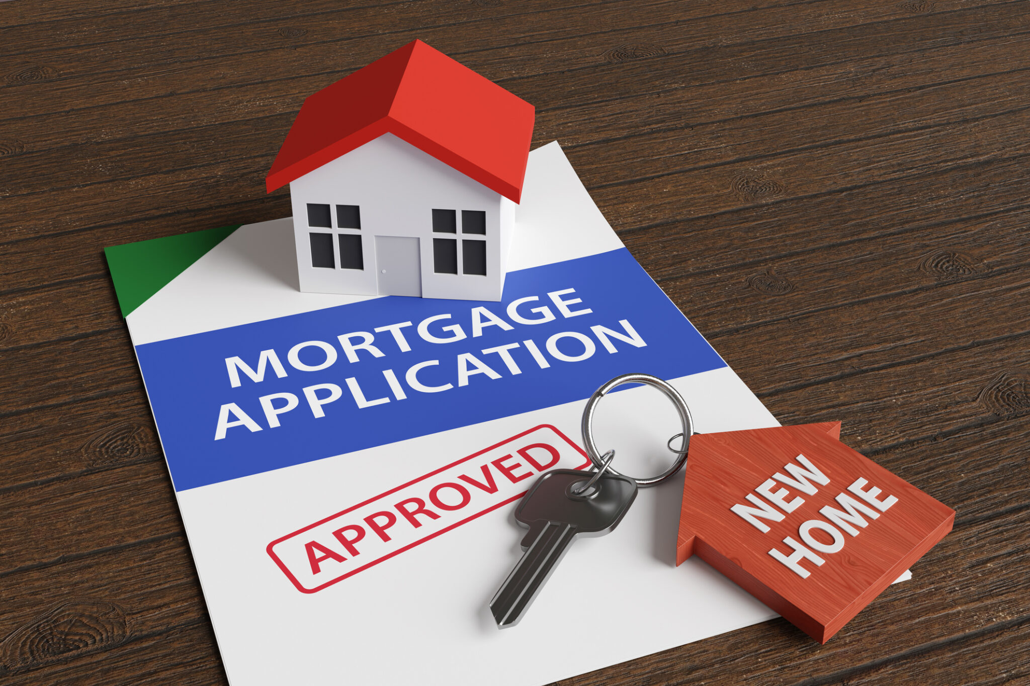 Toy house and a door key on a bound contract with its cover showing mortgage application and a red approved stamp on wooden table. Illustration of the concept of home ownership and mortgage loans